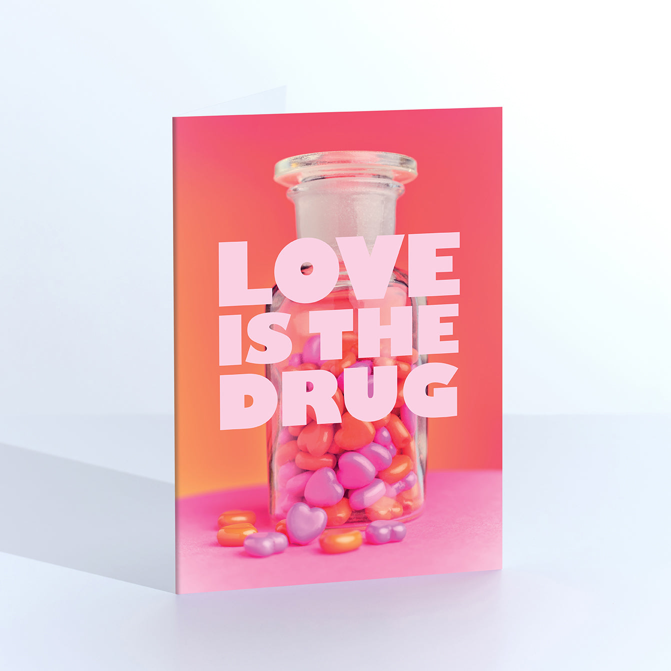 Love Is The Drug Greetings Card