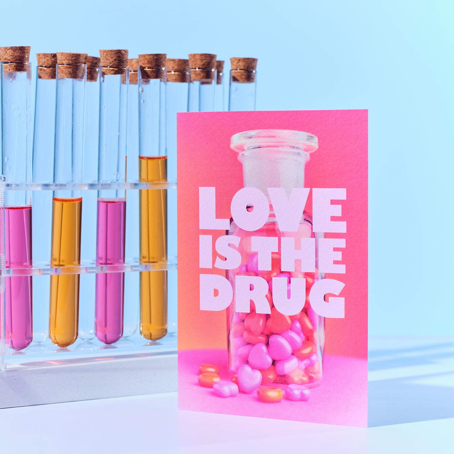 Love Is The Drug Greetings Card